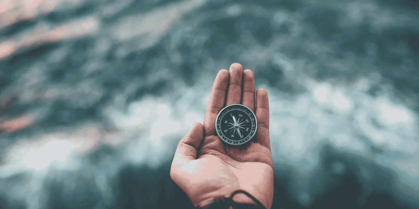 compass in hand